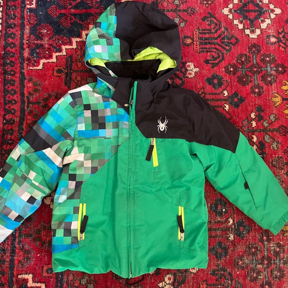Spyder kids ski jacket. Great condition. Fantastic coat. Bibs also for sale.